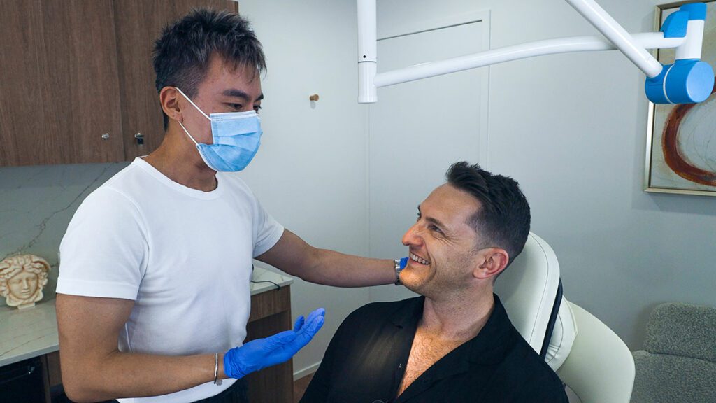 Man Getting Cosmetic Consultation With Male Doctor at Brisbane Cosmetic Clinic | Eleventh Heaven™ Man Getting Cosmetic Consultation With Male Doctor at Brisbane Cosmetic Clinic